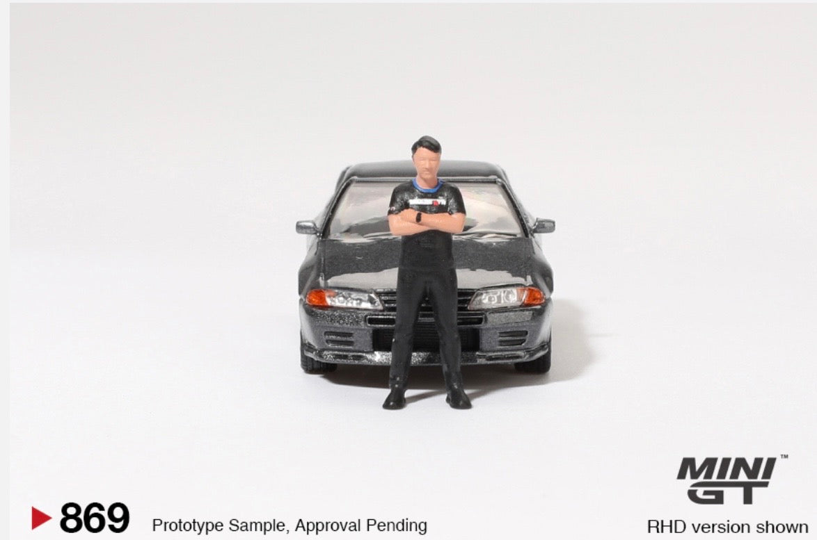 1:64 Nissan Skyline GT-R (R32) Gunmetal with Matsuda Figure Tsugio Matsuda Collection Mini GT 869