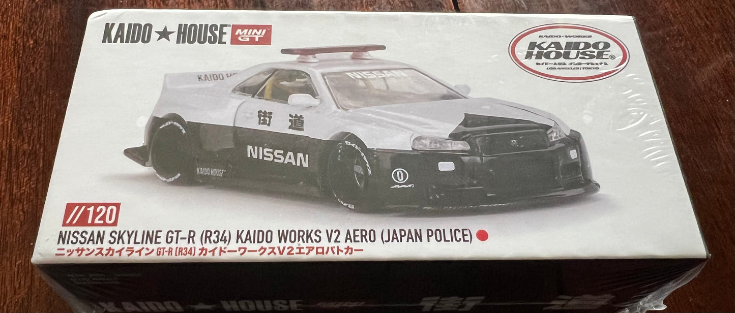 1:64 Nissan Skyline GT-R (R34) Kaido Works V2 Aero (Japan Police) #120 Kaido House
