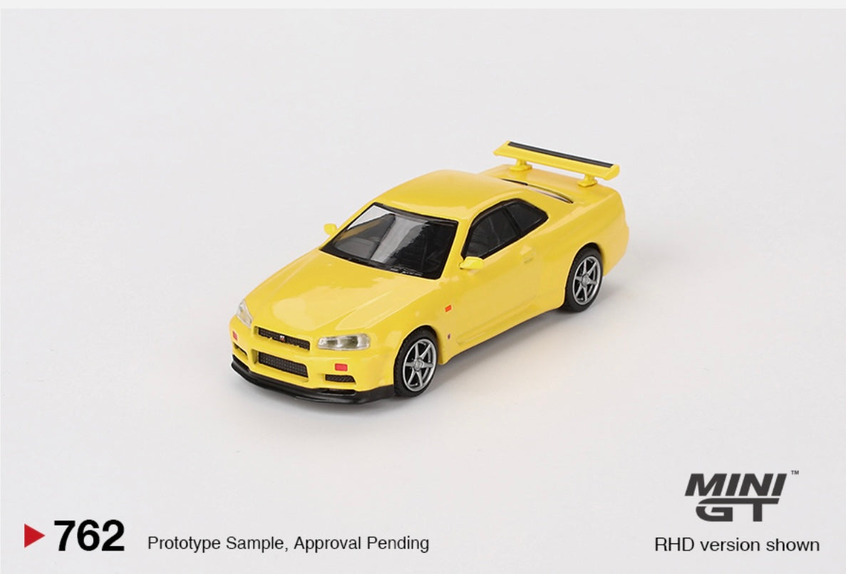 1:64 Nissan Skyline GT-R (R34) V-Spec Lighting Yellow Mini GT 762