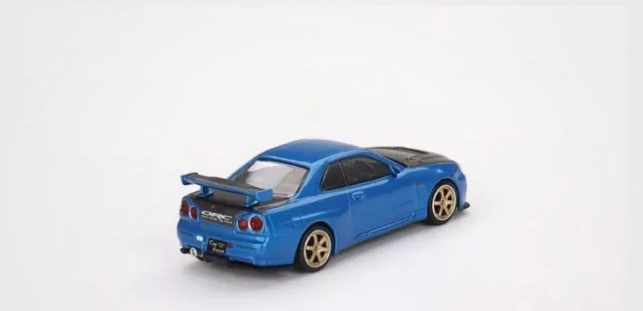 1:64 Nissan Skyline GT-R (R34) Top Secret Bayside Blue Mini GT 531