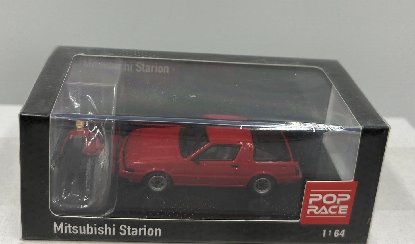 1:64 Mitsubishi Starion Red with Figure Pop Race