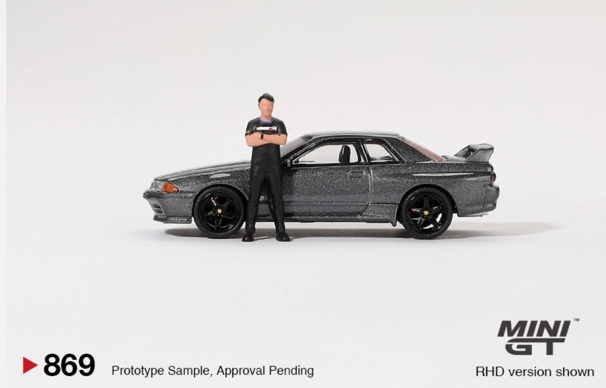 1:64 Nissan Skyline GT-R (R32) Gunmetal with Matsuda Figure Tsugio Matsuda Collection Mini GT 869