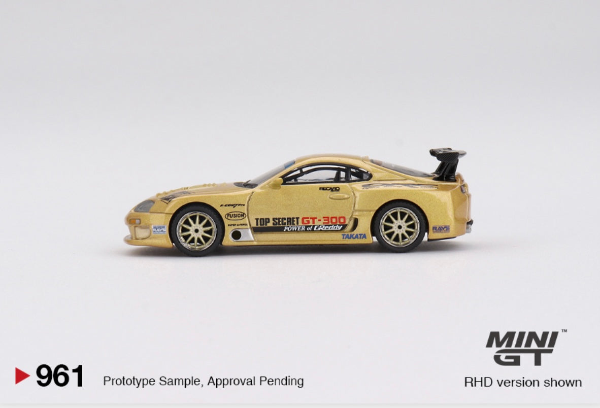 1:64 Toyota Supra (A80) Top Secret GT-300 Top Secret Gold Mini GT 961